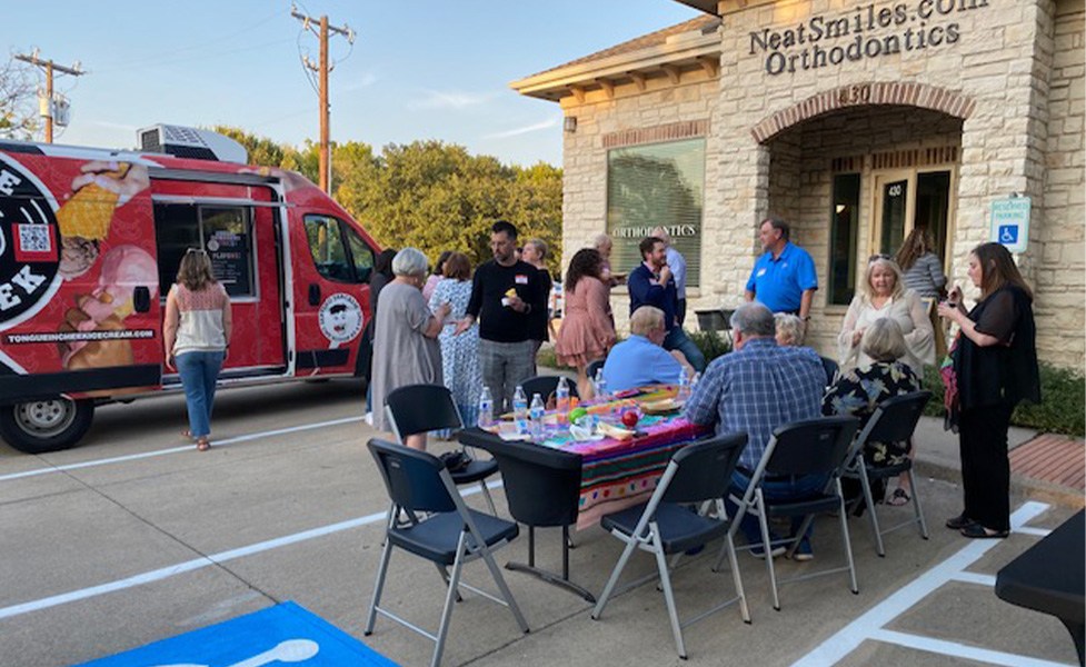 Food truck and table in front of Hanson Orthodontics of Allen