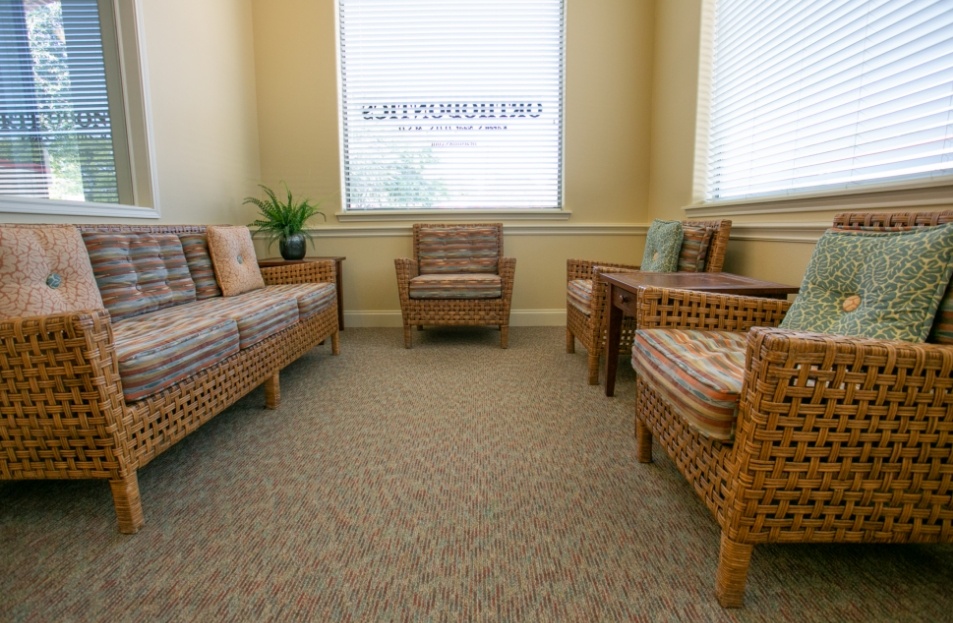 Row of wicker chairs in reception area